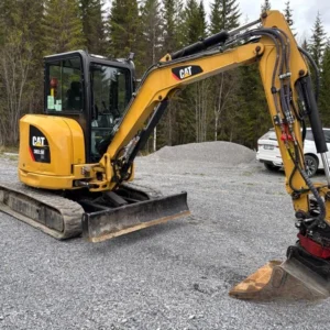 Caterpillar 303.5E CR et 4 remorques (Machine d'occasion)